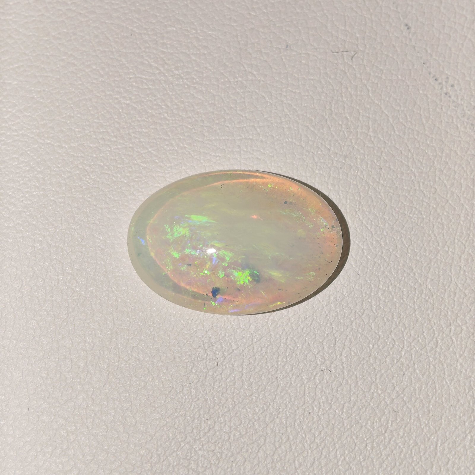 Natural Australian Fire Opal White Oval Cabochon OP-020 Natural Australian Fire Opal white oval cabochon gemstone OP-020 from Australia