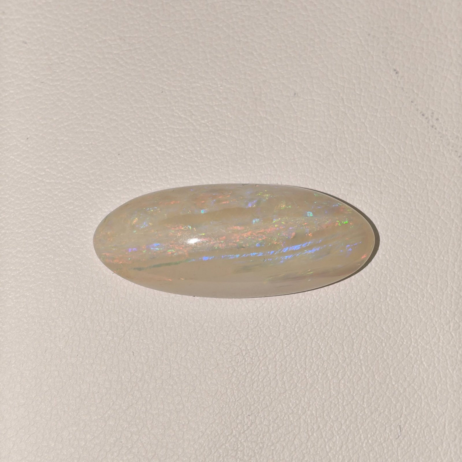 Natural Australian Fire Opal White Oval Cabochon OP-021 Natural Australian Fire Opal white oval cabochon gemstone OP-021 from Australia