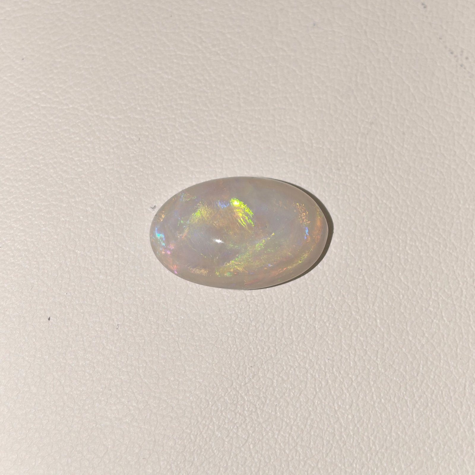 Natural Australian Fire Opal White Oval Cabochon OP-023 Natural Australian Fire Opal white oval cabochon gemstone OP-023 from Australia