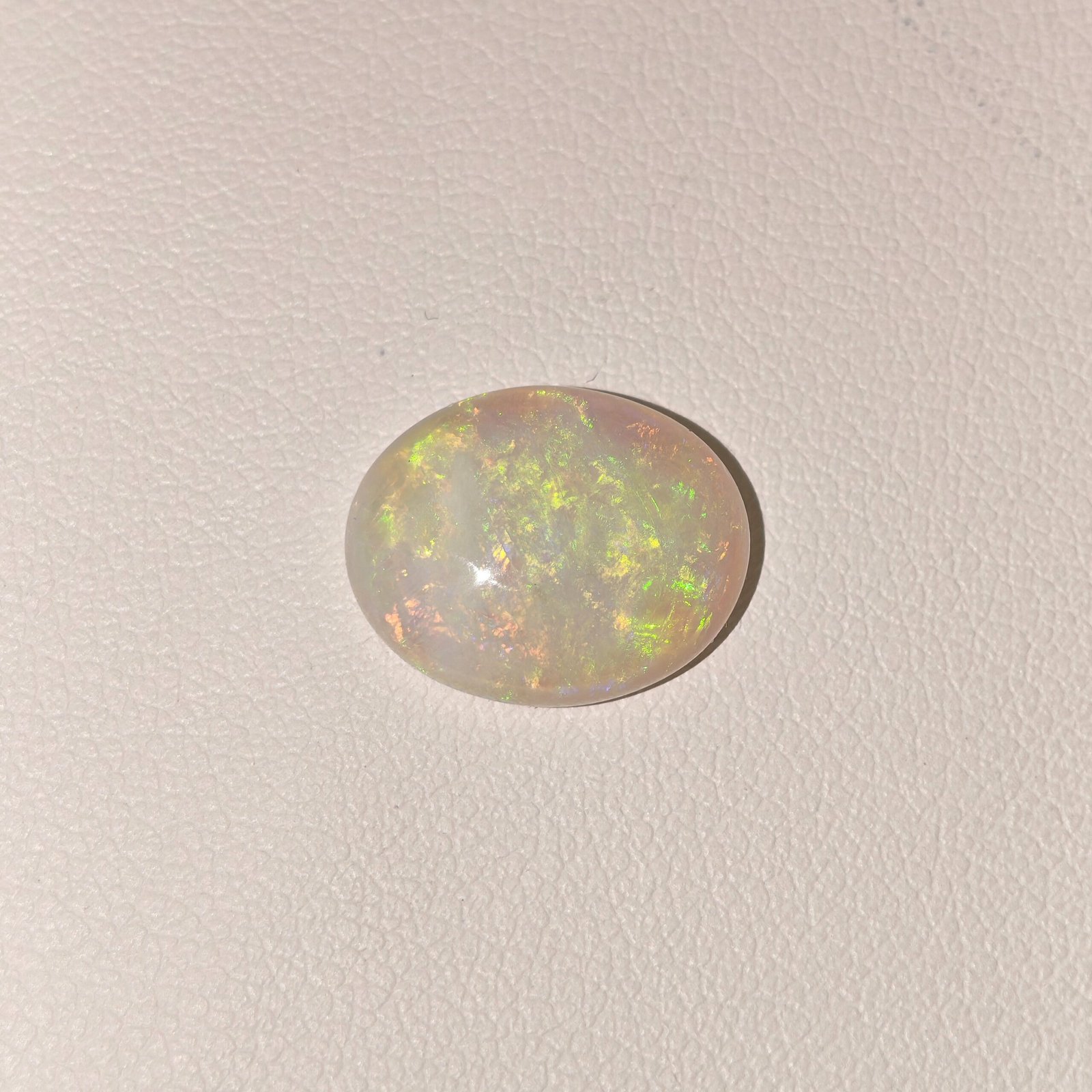 Natural Australian Fire Opal White Oval Cabochon OP-025 Natural Australian Fire Opal white oval cabochon gemstone OP-025 from Australia