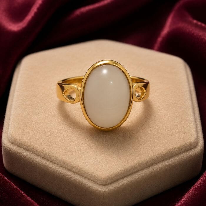 Moonstone Ring featuring a luminous moonstone gemstone with a soft iridescent glow set in an elegant ring design.