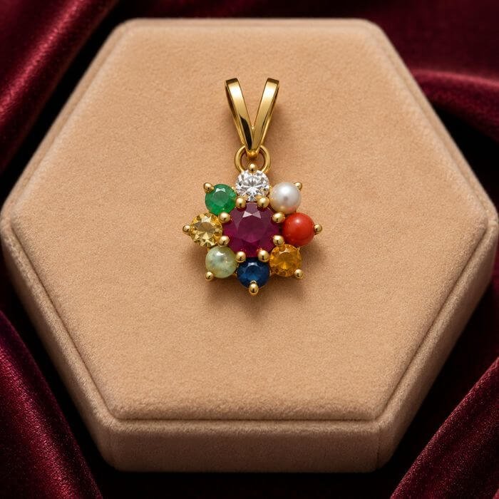 Navratna Pendant featuring nine vibrant natural gemstones arranged in a traditional pendant design with radiant colorful brilliance.