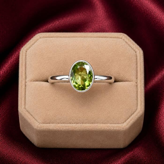 Peridot Ring featuring a vibrant green peridot gemstone set in an elegant polished ring design with radiant natural brilliance.