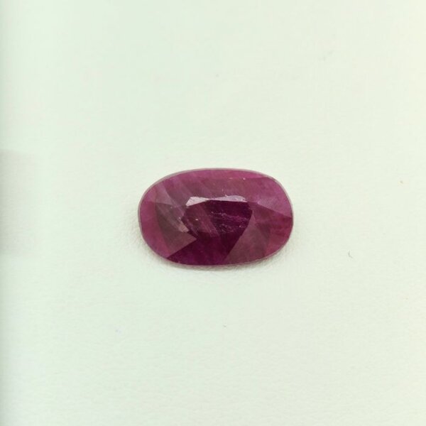 RUB-023 Ruby RUB-023 featuring a vivid natural ruby gemstone with rich crimson red hues, exceptional clarity, and radiant polished brilliance.