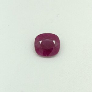 Ruby RUB-018 featuring a vibrant natural ruby gemstone with deep crimson red hues, exceptional clarity, and radiant polished brilliance.
