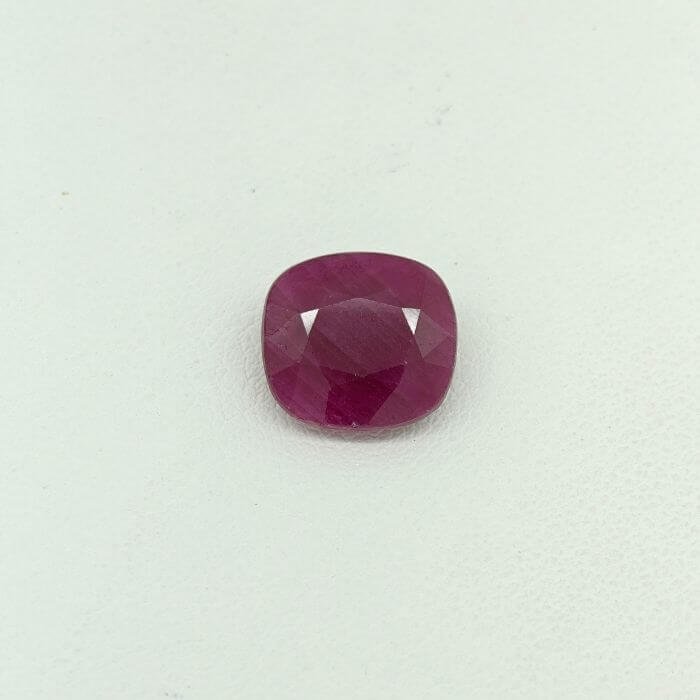Ruby RUB-018 featuring a vibrant natural ruby gemstone with deep crimson red hues, exceptional clarity, and radiant polished brilliance.