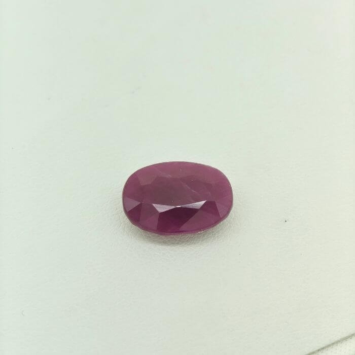 Ruby RUB-024 featuring a vibrant natural ruby gemstone with deep crimson red hues, exceptional clarity, and radiant polished brilliance.