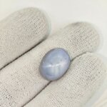 Certified Natural Star Blue Sapphire gemstone with a beautiful natural asterism, rich blue color, and smooth oval cabochon shape, ideal for jewelry and gemstone collections.