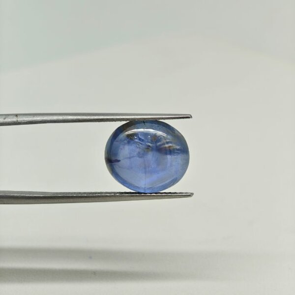 Natural Star Blue Sapphire ST-005 is a certified loose gemstone showcasing a beautiful six-rayed star effect (asterism), rich blue color, and smooth cabochon finish. Ideal for custom rings, pendants, bracelets, gemstone collections, and astrological purposes.