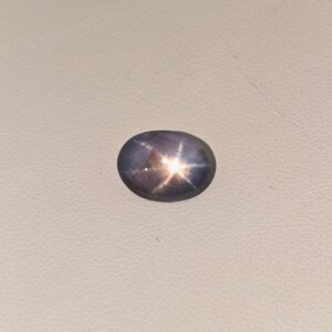 Star Blue Sapphire ST-011 featuring a rich deep blue natural gemstone with a luminous star-like asterism effect and polished elegant finish.