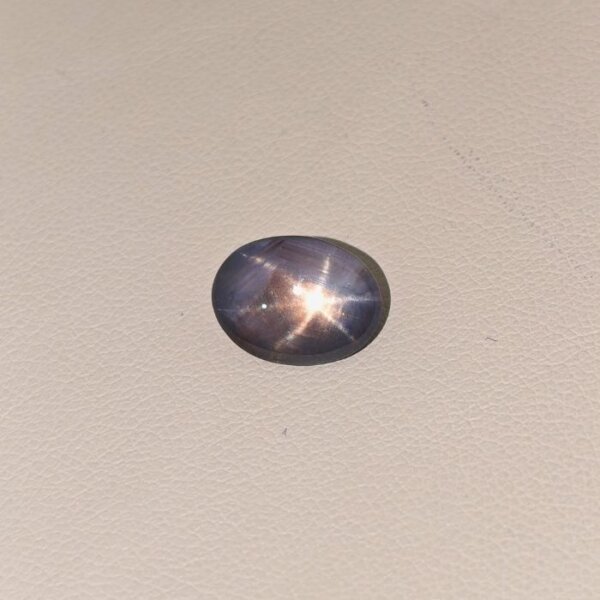 STAR BLUE SAPPHIRE ST-011 Star Blue Sapphire ST-011 featuring a rich deep blue natural gemstone with a luminous star-like asterism effect and polished elegant finish.