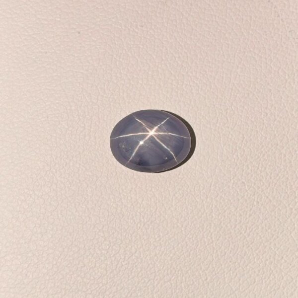 STAR BLUE SAPPHIRE ST-014 Star Blue Sapphire ST-014 featuring a rich royal blue natural gemstone with a brilliant star-like asterism effect and polished luxurious finish.