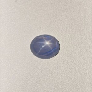 Star Blue Sapphire ST-015 featuring a deep velvety blue natural gemstone with a radiant star-like asterism effect and polished premium finish.