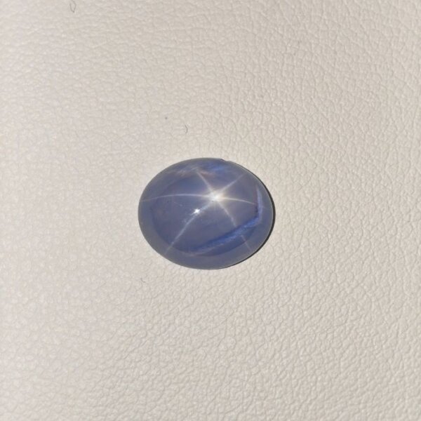 Star Blue Sapphire ST-015 featuring a deep velvety blue natural gemstone with a radiant star-like asterism effect and polished premium finish.
