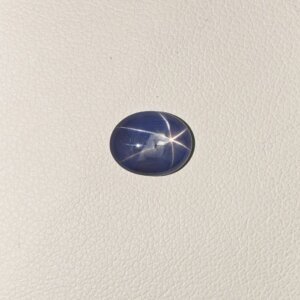 Star Blue Sapphire ST-016 featuring a rich royal blue natural gemstone with a luminous star-like asterism effect and polished premium finish.