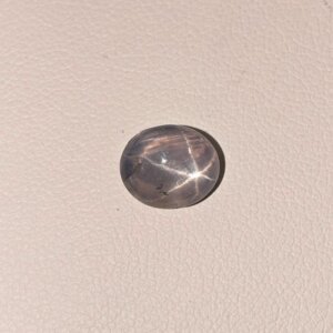 Star Blue Sapphire ST-017 featuring a deep royal blue natural gemstone with a brilliant star-like asterism effect and polished luxurious finish.