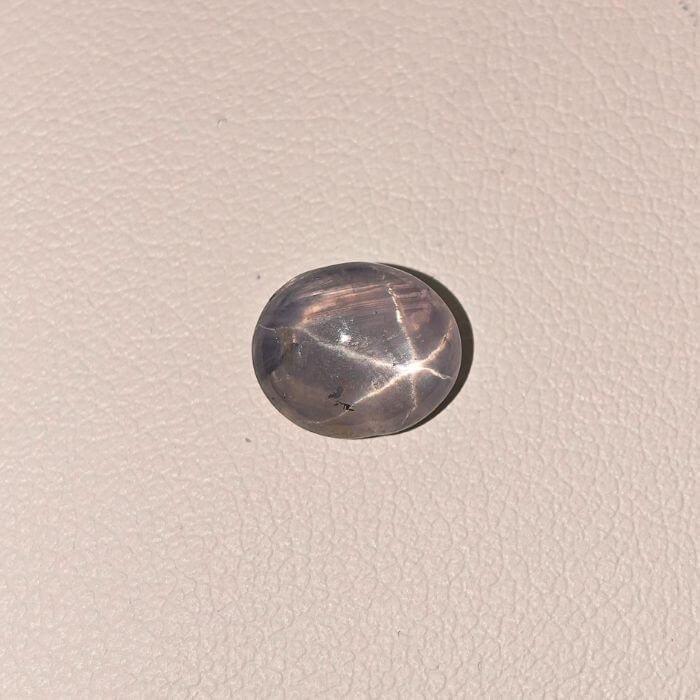 Star Blue Sapphire ST-017 featuring a deep royal blue natural gemstone with a brilliant star-like asterism effect and polished luxurious finish.