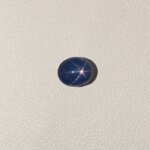 Star Blue Sapphire ST-018 featuring a rich deep blue natural gemstone with a radiant star-like asterism effect and polished premium finish.