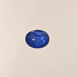 Star Blue Sapphire ST-019 featuring a deep velvety blue natural gemstone with a luminous star-like asterism effect and polished elegant finish.