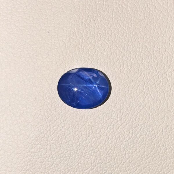 STAR BLUE SAPPHIRE ST-019 Star Blue Sapphire ST-019 featuring a deep velvety blue natural gemstone with a luminous star-like asterism effect and polished elegant finish.