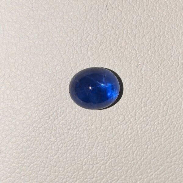 STAR BLUE SAPPHIRE ST-020 (1) Star Blue Sapphire ST-020 featuring a rich royal blue natural gemstone with a brilliant star-like asterism effect and polished premium finish.