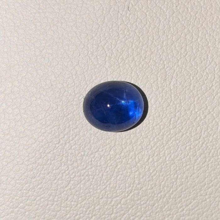 Star Blue Sapphire ST-020 featuring a rich royal blue natural gemstone with a brilliant star-like asterism effect and polished premium finish.