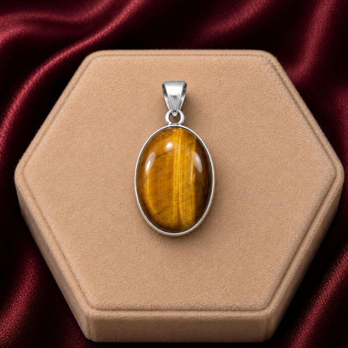 Tiger Eye Pendant featuring a golden-brown Tiger Eye gemstone with a captivating silky chatoyant shine set in an elegant pendant design.