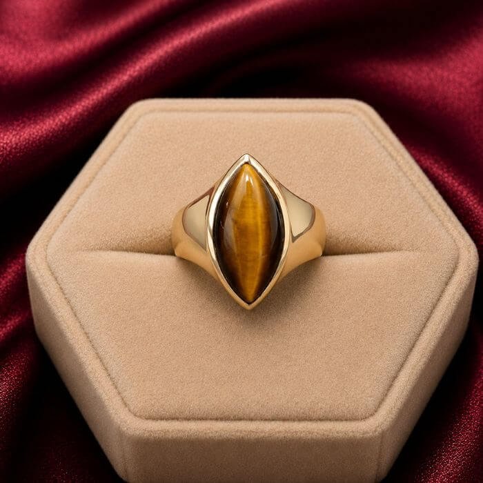 Tiger Eye Ring featuring a golden-brown Tiger Eye gemstone with a captivating silky chatoyant shine set in an elegant ring design.